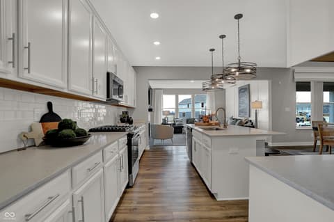Kitchen at 19805 Hazelnut Boulevard, Noblesville, IN — Stunning modern kitchen with premium finishes and island.