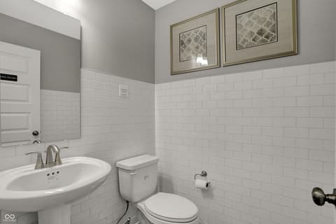 Bathroom at 19805 Hazelnut Boulevard, Noblesville, IN — Bright, clean bathroom with classic subway tile design.