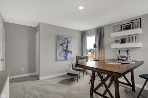 Home office at 19805 Hazelnut Boulevard, Noblesville, IN — Bright contemporary home office with floating shelves.