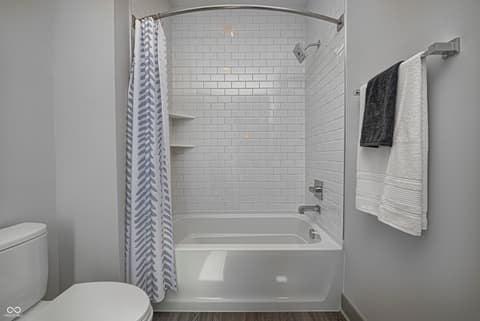Bathroom at 162 Midland Trace Loop, Westfield, IN — Bright, clean bathroom with updated subway tile shower.