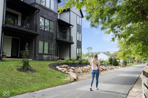 Front exterior at 162 Midland Trace Loop, Westfield, IN — Modern multi-level home with premium architectural finishes.