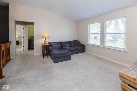 Living room at 2394 Woodcreek Crossing Boulevard, Avon, IN