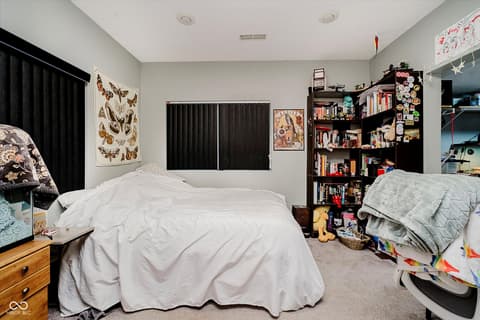 Bedroom at 9135 E 256th Street, Arcadia, IN — Spacious bedroom with blackout blinds and built-in storage.