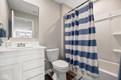 Bathroom at 887 Tuxedo Drive, Westfield, IN — Bright, updated bathroom with ample vanity storage.