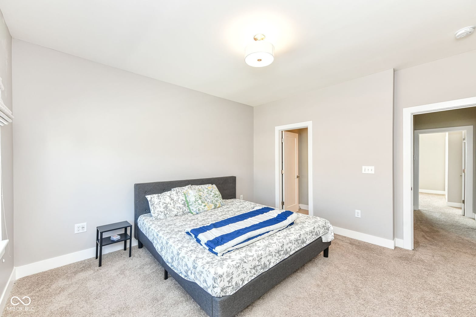 Spacious primary bedroom with ensuite and walk-in closet.