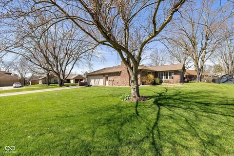 Side exterior at 8311 Chateaugay Drive, Indianapolis, IN