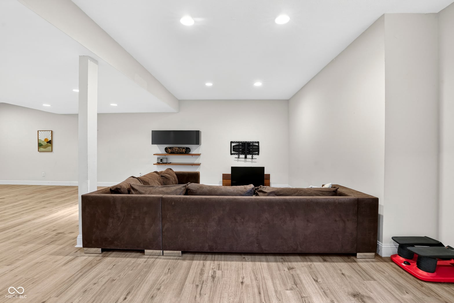 Bright modern family room with spacious sectional seating.