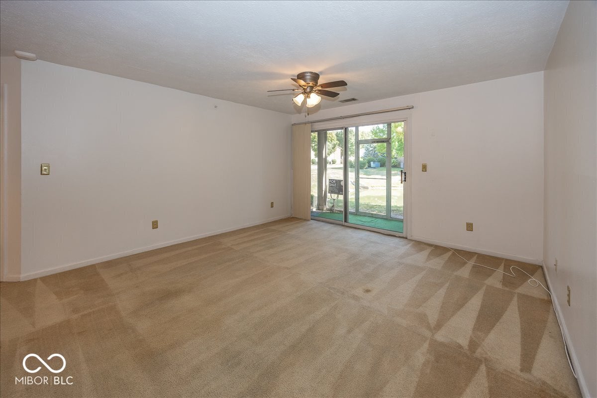 Bright open room with sliding patio access.