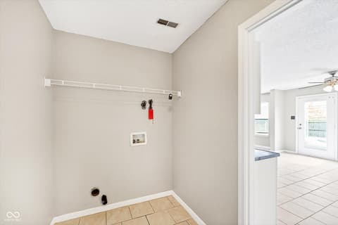Laundry room at 10917 Sweetsen Road, Camby, IN