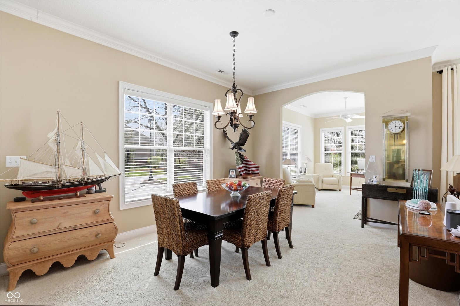 Elegant dining space with natural light and classic decor.