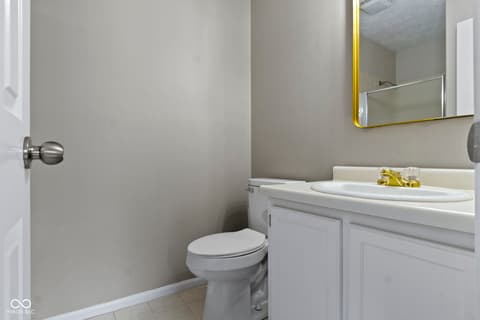 Bathroom at 6047 Southbay Drive, Indianapolis, IN — Clean, updated bathroom with modern fixtures and finishes.