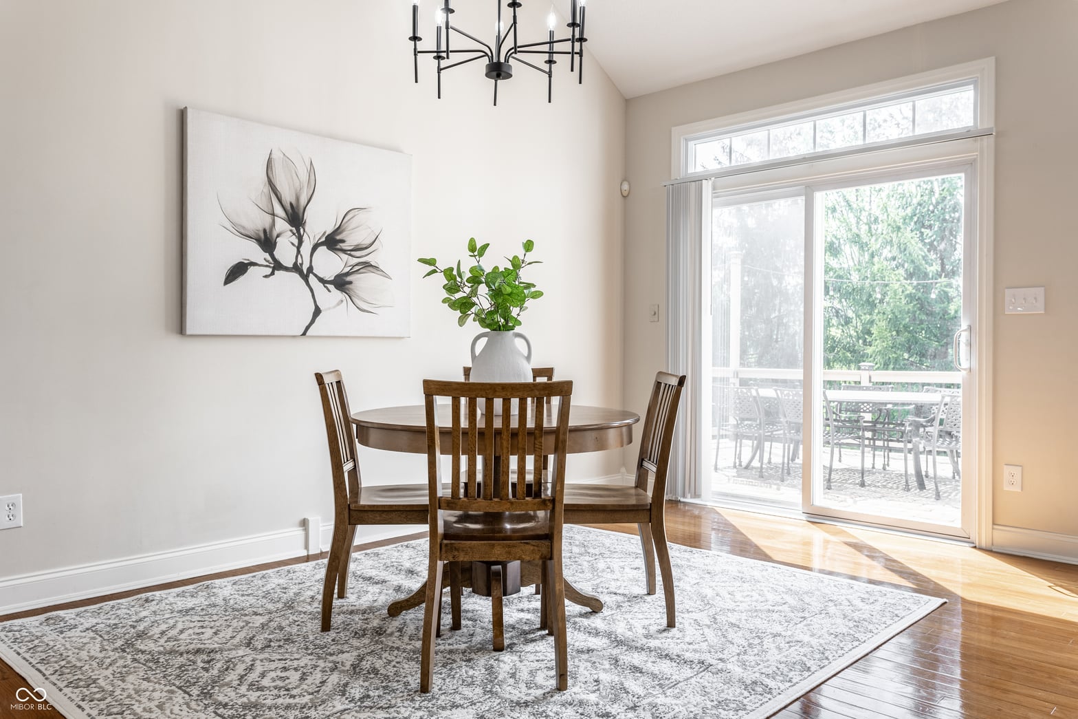Dining room at 3929 Andretti Drive, Zionsville, IN — Bright dining area with deck access and natural light.