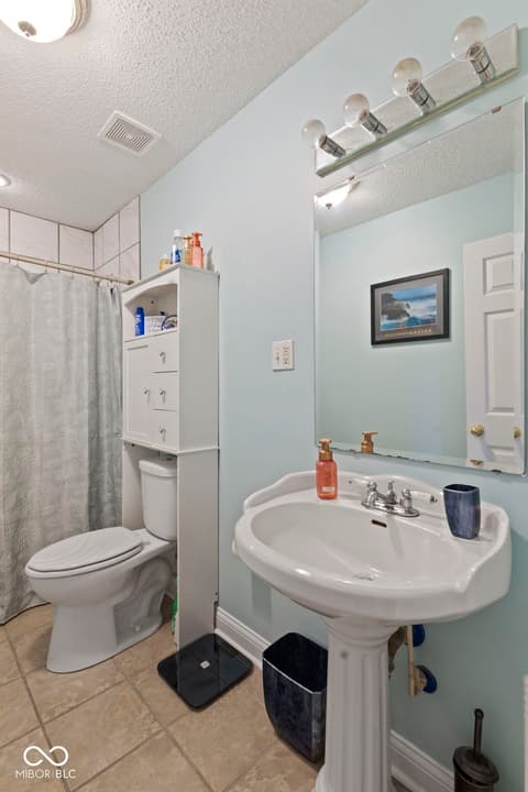 Bathroom at 4012 S Loganberry Court, New Palestine, IN