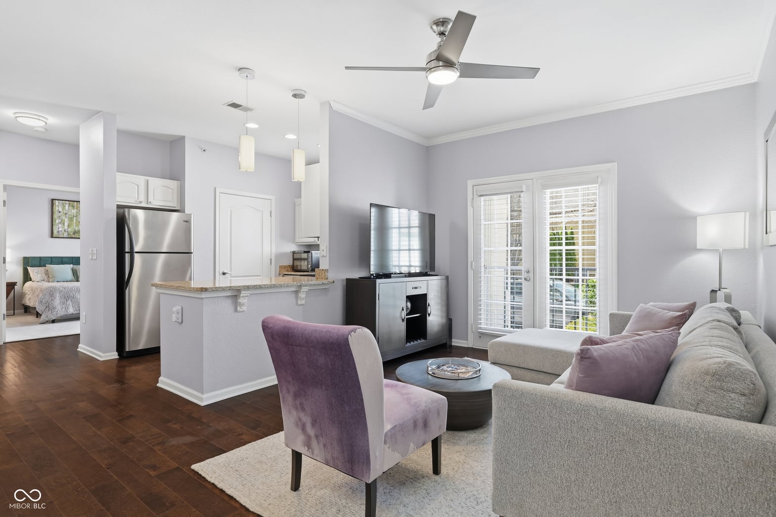 Bright open-concept living with updated kitchen and modern amenities.