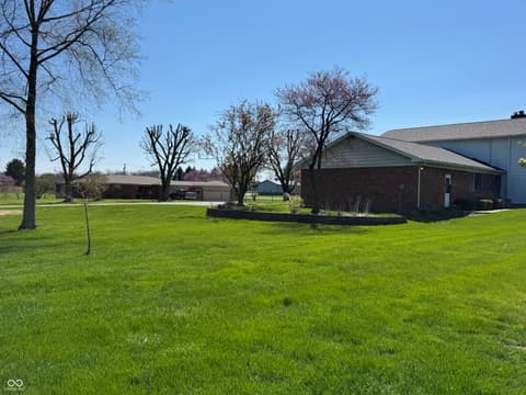 Side exterior at 353 E Rivercrest Drive, Rushville, IN