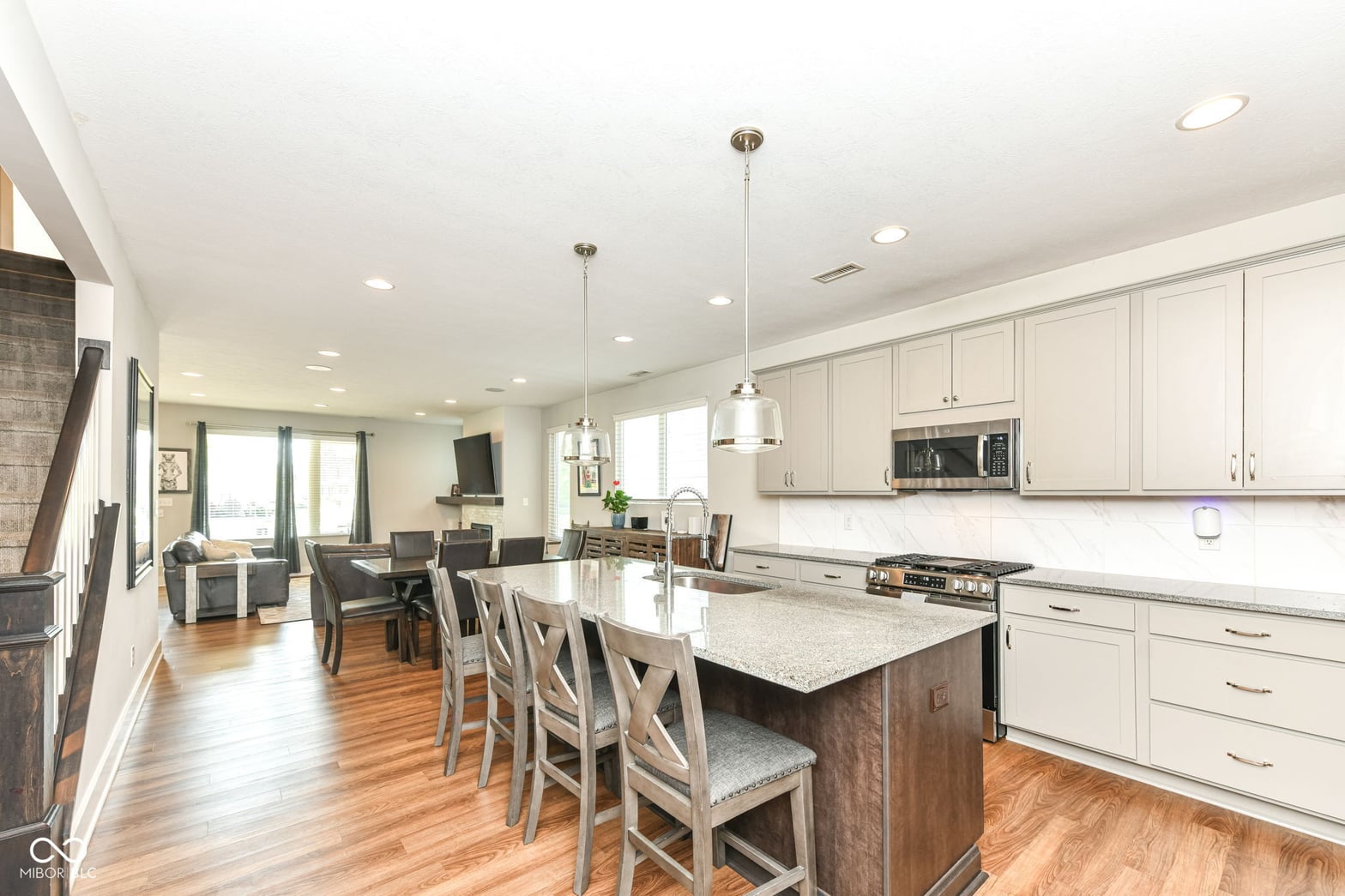 Bright open-concept kitchen with island and premium finishes.