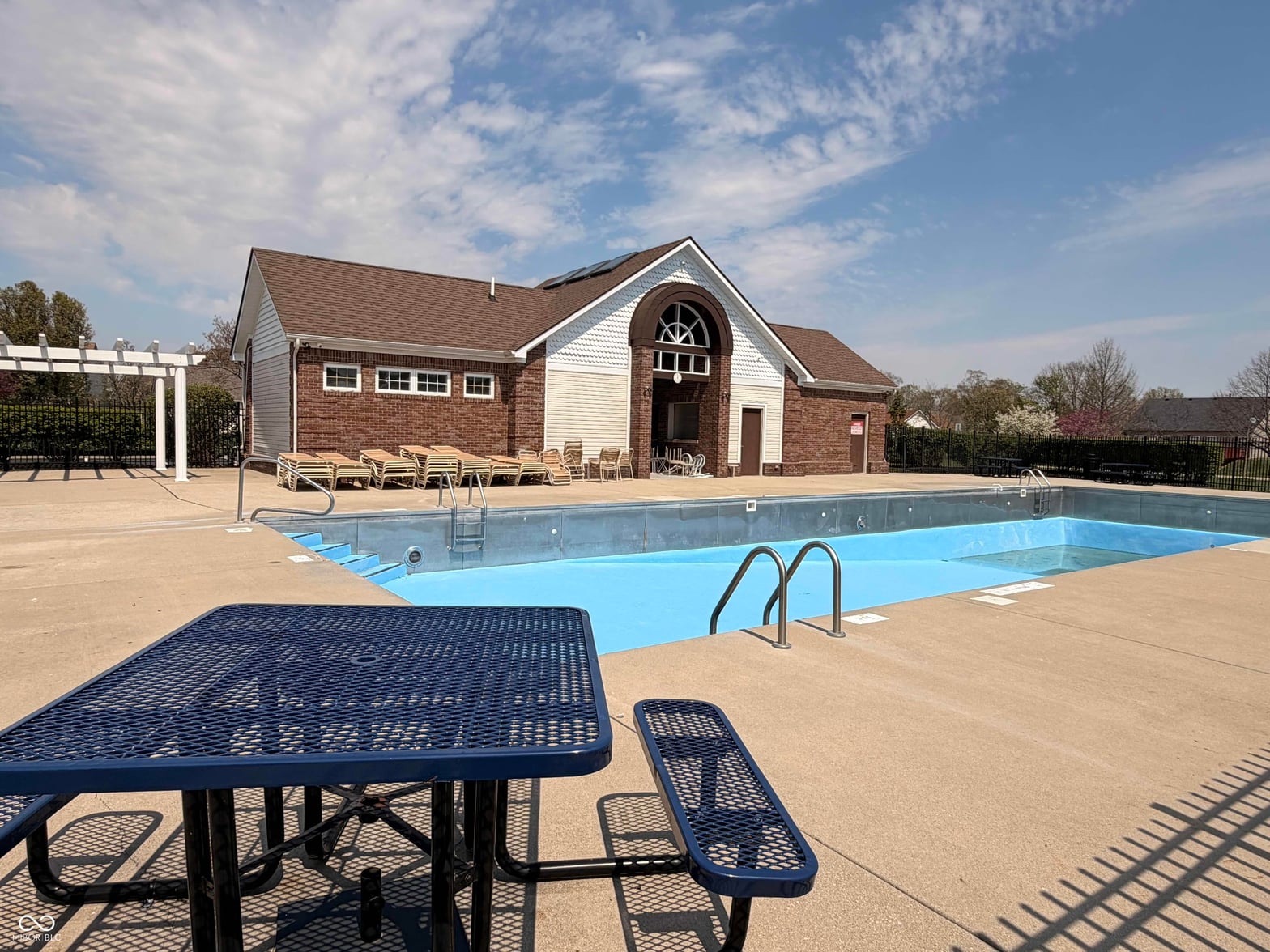 Community pool with dedicated house and picnic area.