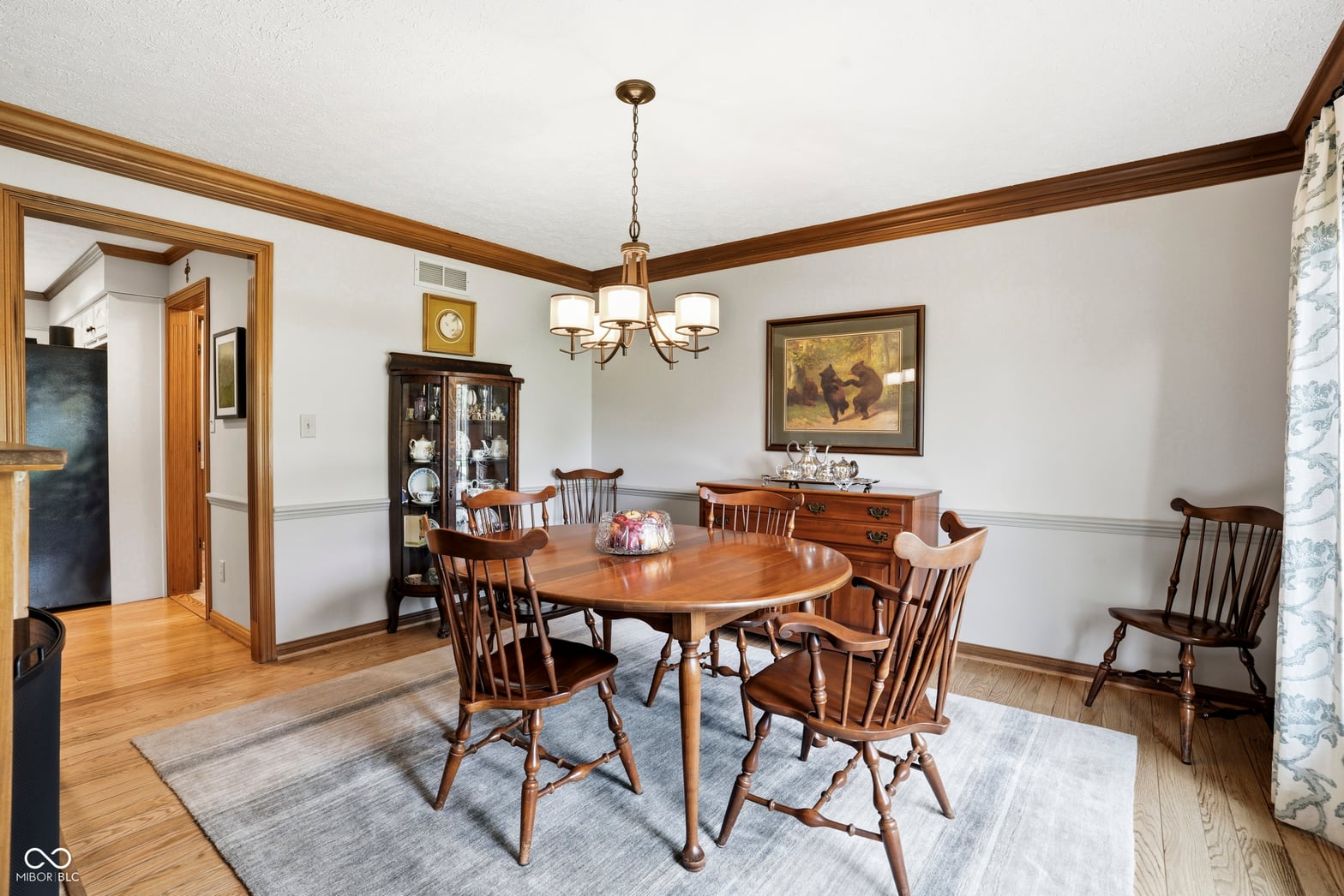 Elegant traditional dining room with quality wood furnishings.