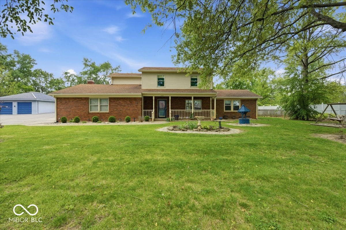 Front exterior at 1343 S Buttercup Drive, New Palestine, IN
