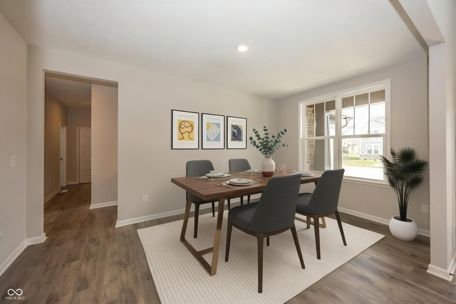 Bright contemporary dining room with abundant natural light.