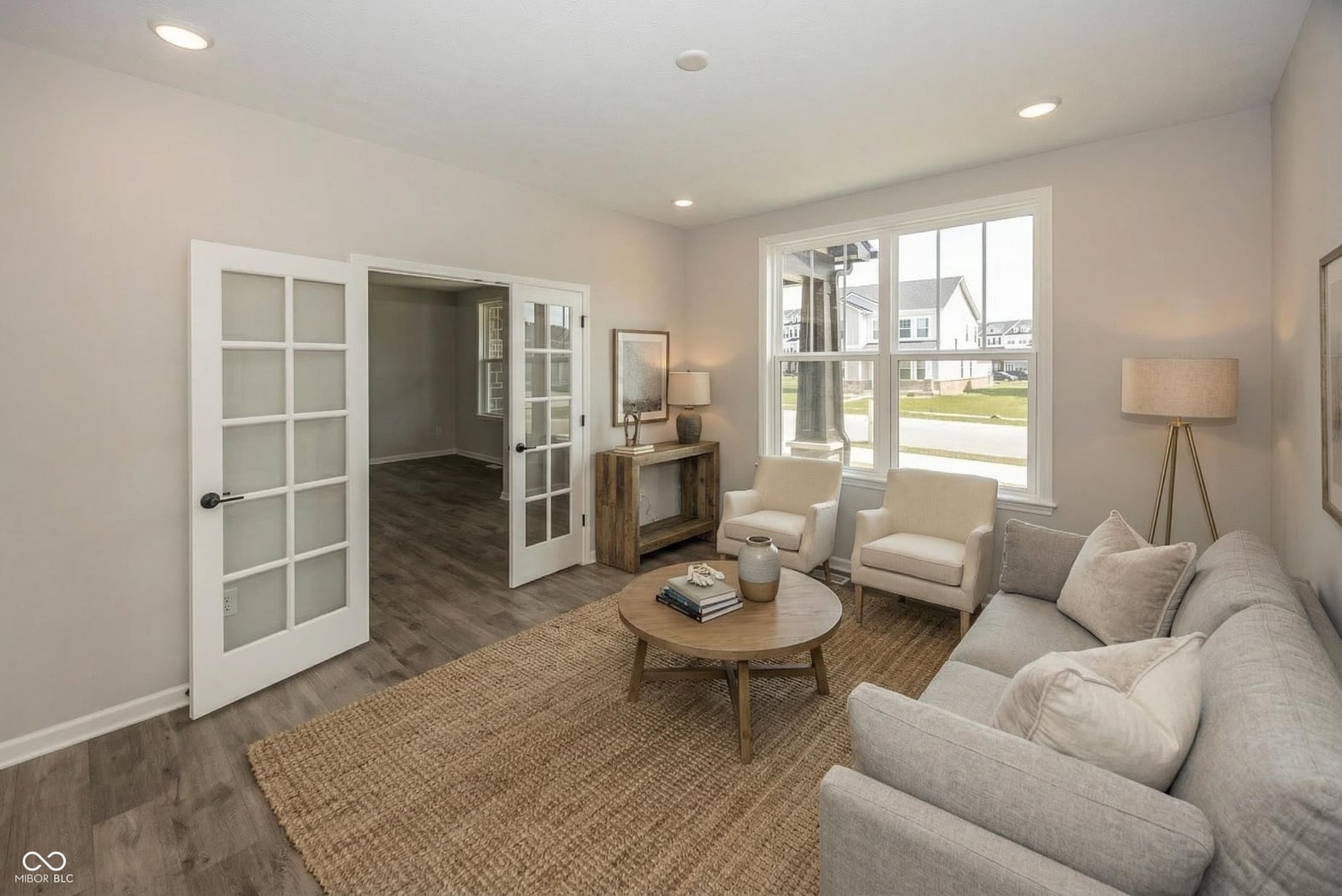 Bright, spacious living room with modern finishes and natural light.