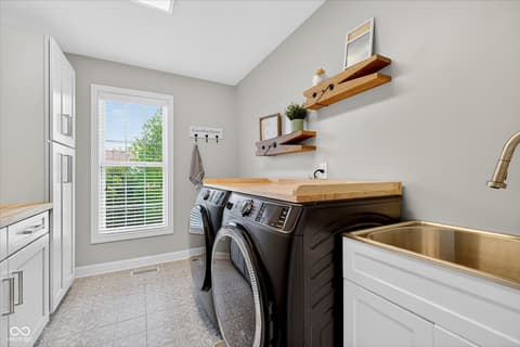 Laundry room at 14081 Pecos Court, Carmel, IN