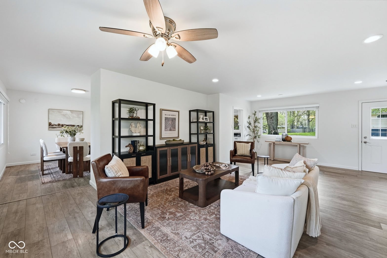 Bright, open family room with modern furnishings and natural light.