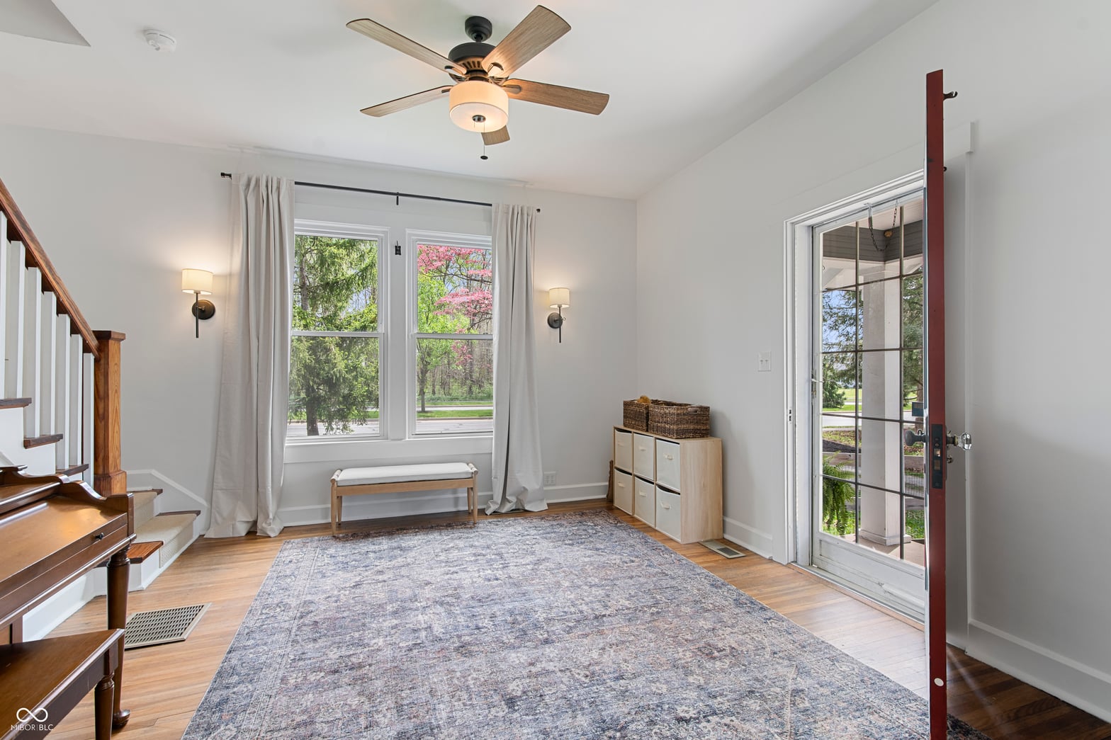 Bright family room with French doors and abundant natural light.