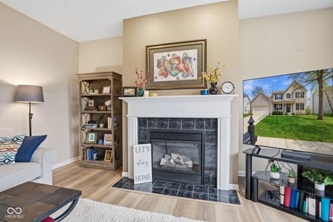 Living room at 7398 Dunmore Point, Noblesville, IN