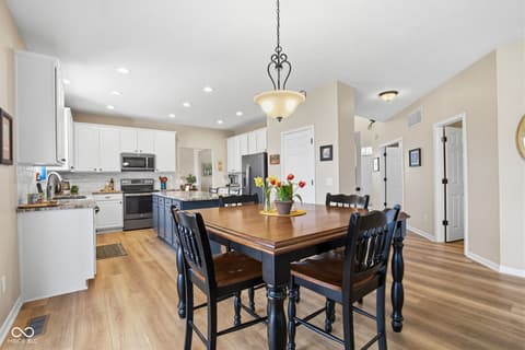 Dining room at 7398 Dunmore Point, Noblesville, IN