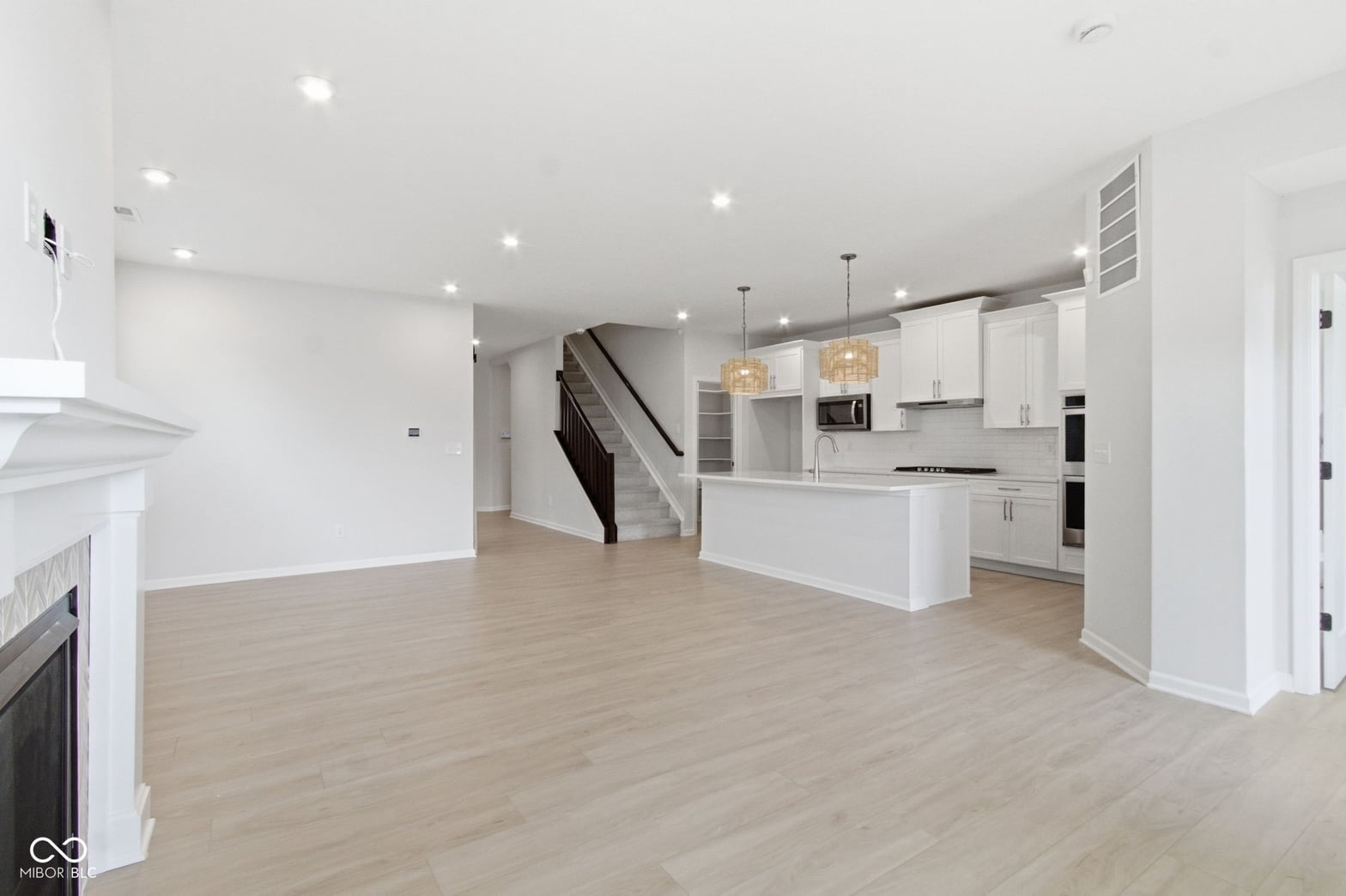 Bright open-concept living with modern kitchen and premium finishes.