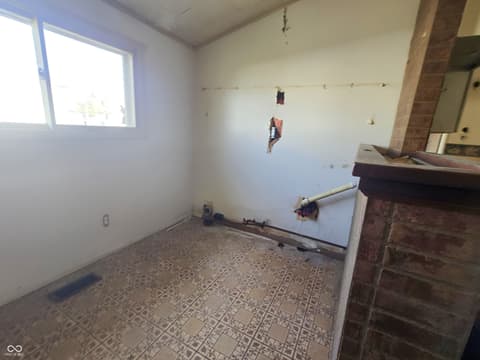 Laundry room at 210 N Lessie Street, Worthington, IN