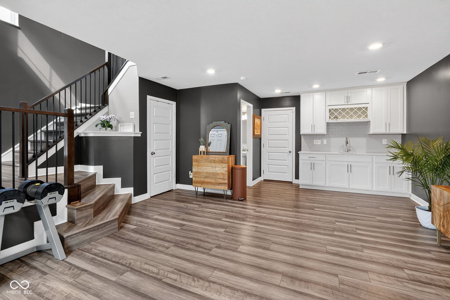 Modern kitchen with open floor plan and updated finishes.