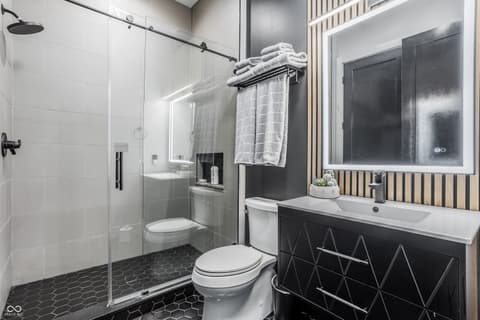 Primary bathroom at 13120 Broad Street, Carmel, IN — Luxurious modern primary bath with spa-like finishes.