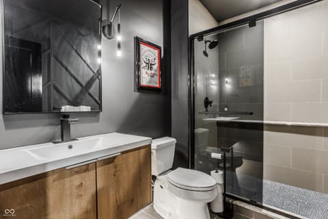 Primary bathroom at 13120 Broad Street, Carmel, IN — Luxurious modern primary bath with spa-like finishes.