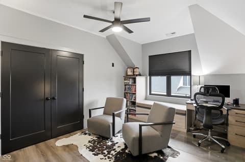 Bonus room at 13120 Broad Street, Carmel, IN — Bright bonus room with vaulted ceiling and skylights.
