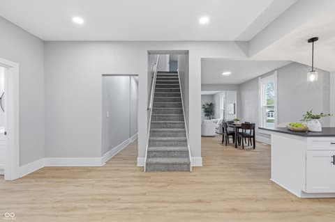 Foyer at 350 S Broadway Street, Atlanta, IN — Bright open foyer with stairs and premium finishes.