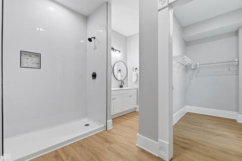 Primary bathroom at 350 S Broadway Street, Atlanta, IN — Luxurious primary bath with walk-in shower and closet.
