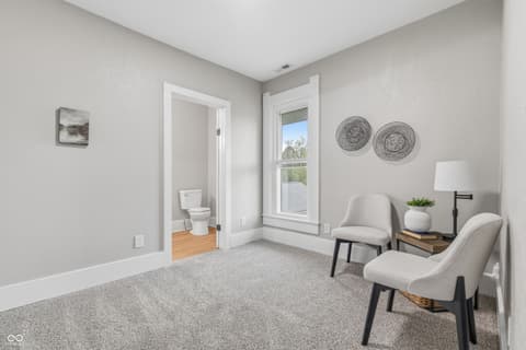 Bonus room at 350 S Broadway Street, Atlanta, IN — Bright bonus room with ensuite bathroom and scenic views.