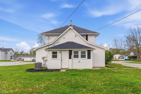 Front exterior at 350 S Broadway Street, Atlanta, IN — Classic farmhouse on spacious, well-maintained lot.