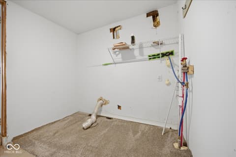 Laundry room at 24144 Stipps Hill Road, Laurel, IN