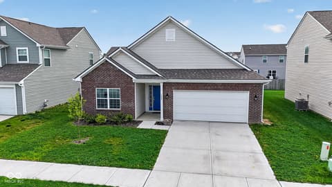 Front exterior at 1453 Silver Pine Lane, Sheridan, IN