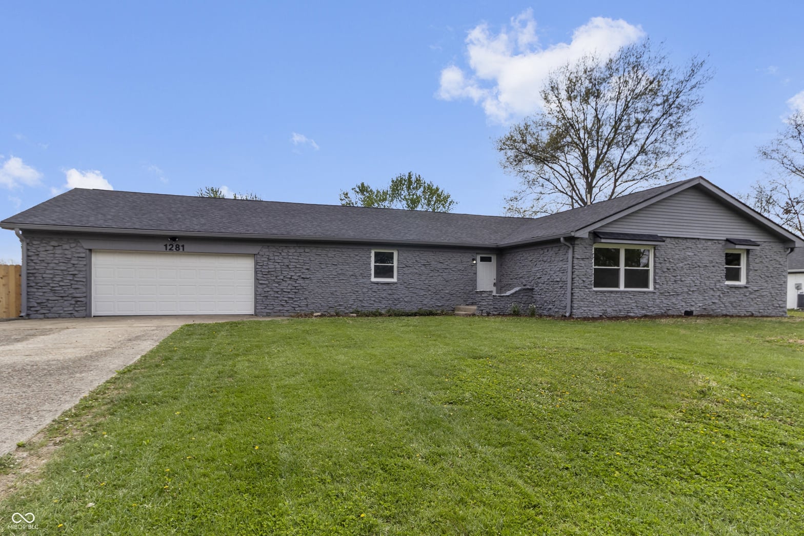 Front exterior at 1281 Fox Trail Drive E, New Palestine, IN