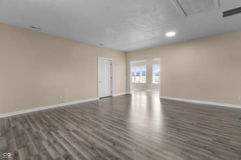 Family room at 1281 Fox Trail Drive E, New Palestine, IN