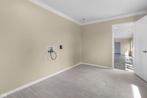 Laundry room at 1281 Fox Trail Drive E, New Palestine, IN