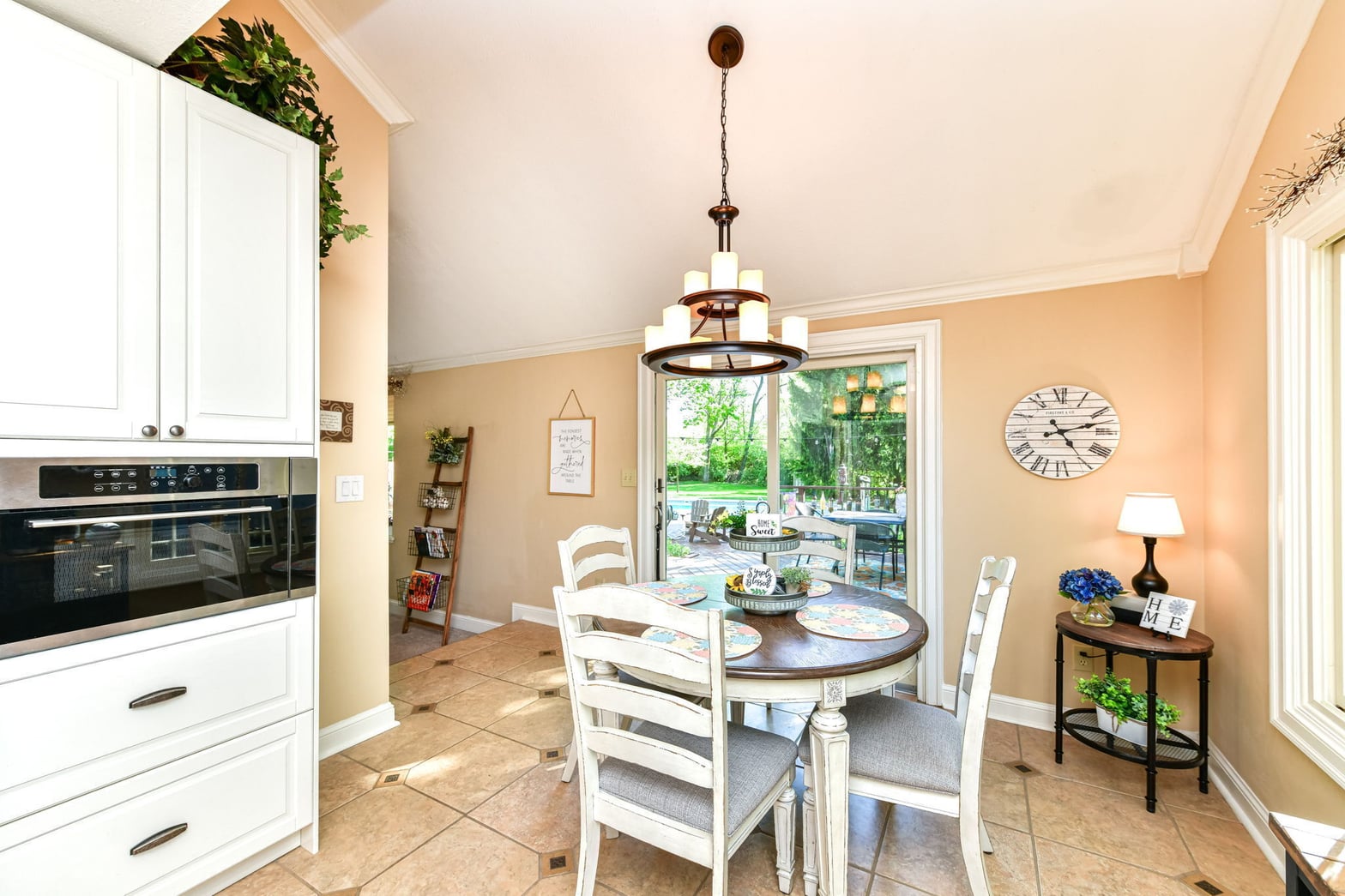 Bright kitchen with dining area and patio access.