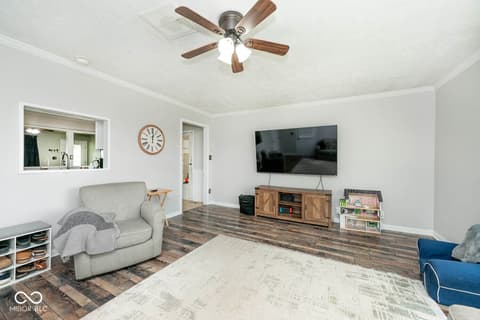 Living room at 5469 W Village Drive, New Palestine, IN