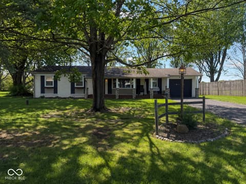 Front exterior at 5469 W Village Drive, New Palestine, IN