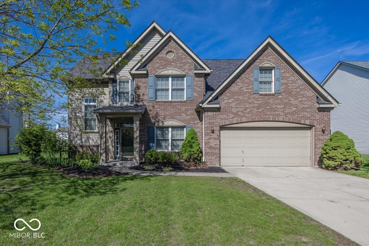 Front exterior at 1128 Red Dunes Run, Avon, IN