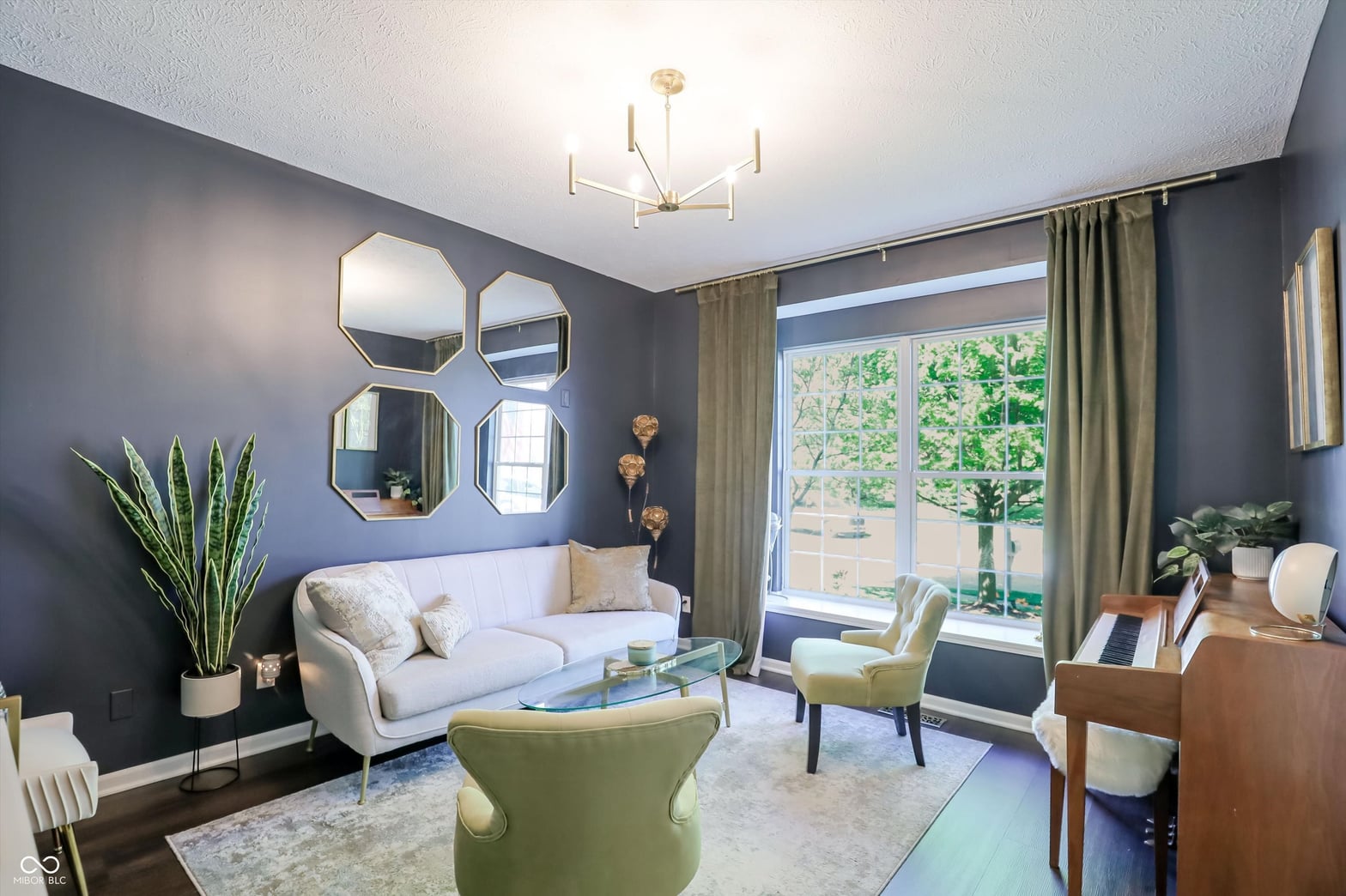 Stylish contemporary living room with modern furnishings and natural light.